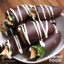 Is It A Dessert Or Is It A Snack Chocolate Covered Peanut Butter Filled Jalape Party Food Dessert Chocolate Covered Jalapenos Recipe Chocolate Covered Peanuts