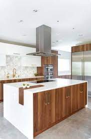 Recent modern design reflects a trend towards midcentury modern furniture, which features bold angles and curves. 17 Walnut Kitchen Cabinet Ideas Sebring Design Build