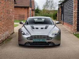 Image result for Titanium Silver 2011 Aston Martin