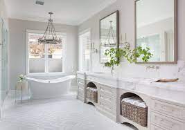 Natural master bathroom the relaxed, peaceful feel of the master bedroom flows right into the bath by means of ample tilework in varying shades of gray and brown. Rustic Southern Charm Country Bathroom Designs French Country Bathroom Bathroom Design