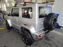 Overcome muddy pits, manoeuvre through. File 2020 Suzuki Jimny 1 5 Auto With Vanguard Bodykit Rear View In Brunei Jpg Wikimedia Commons
