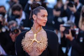 Maybe you would like to learn more about one of these? Bella Hadid S Schiaparelli Gown At Cannes Showed Her Tiny Underboob Tattoo See Photos Teen Vogue