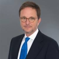 John Kusturiss Email & Phone Number