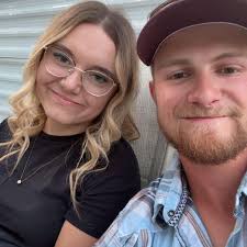 Is anyone missing a small white ferret with a brown or gray stripe in town?