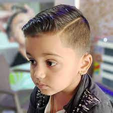 One of the most popular hairstyles for little boys is a short haircut with bangs that you can lift or place on the. 28 Coolest Boys Haircuts For School In 2021