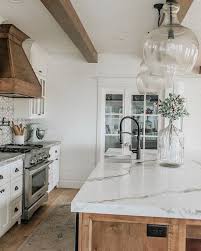 White Shaker Style Cabinets With A Little Natural Wood Mixed In Walnut Cherry Or Farmhouse Kitchen Countertops Kitchen Design Countertops Home Decor Kitchen