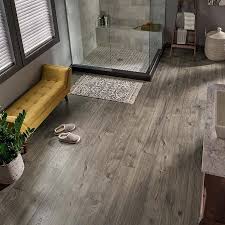 Find vinyl plank at lowest price guarantee. Pergo Timbercraft Wetprotect Waterproof Anchor Grey Oak 7 48 In W X 54 33 In L Waterproof Embossed Wood Plank Laminate Flooring 16 93 Sq Ft Lowes Com In 2021 Laminate Flooring Grey Hardwood Floors Oak Laminate Flooring