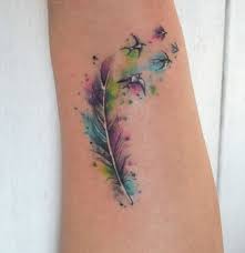 As a symbol of an endless circle of life and reincarnation, the feather dissolving into the flock of birds is one of the most noticed tattoo designs. Wonderful Feather Tattoos For Arm Segerios Com