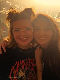 Best friends attend concert in Denver