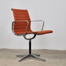 The eames lounge chaise is a comfortable and beautiful place to relax for a spell in a study, den, or executive office. Orange Office Armchair By Charles Ray Eames For Herman Miller 1960s 121602