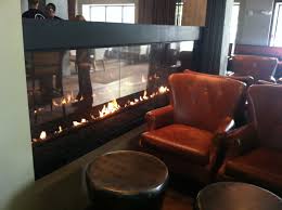 Check spelling or type a new query. Glass Enclosed Fire Pit At Flint Restaurant The Colcorde Hotel In Oklahoma City Oklahoma Outdoor Fireplace Indoor Fireplace Outdoor Kitchen Design