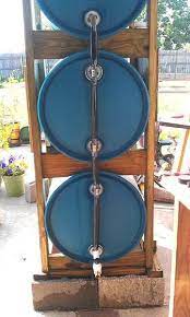 Build A 3 Drum Rain Collection System Better Rain Collection System Rain Water Collection Rain Water Collection System