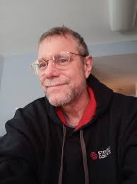 What causes a slight wobble in electric scooter wheels?