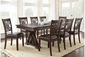 This amazing kitchen table set offers a more traditional look along with dining table and kitchen dining chairs which are right in your own home in either an operational kitchen or formal dining area. Star Adrian Ad600b T 8xs 9 Piece Table And Chair Set With 18 Leaf Efo Furniture Outlet Dining 7 Or More Piece Sets