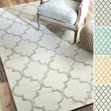 I'm a big fan of subtle colors, lots of texture and some pattern in a space. Nuloom Handmade Moroccan Ivory And Grey Trellis Faux Silk Wool Rug