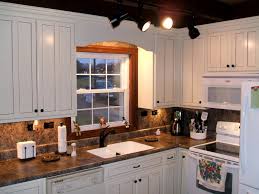 The 7 best cabinet paint colors for a happier kitchen, according to interior designers. Off White Kitchen Cabinets Color Scheme Gbvims Home Makeover Best Option Color Off White Kitchen Cabinets