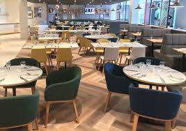 Holiday Inn Wembley The Exceptional Refurbishment Of Holiday Inn Wembley S Open Lobby And Dining Area Required Ta In 2020 Holiday Inn Hotel Furniture Seating Options