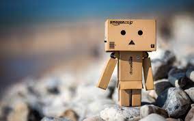 Cute Amazon Box Robot Box Man Robot Amazon Wallpaper Background In 2021 Danbo Robot Wallpaper Amazon Wallpaper