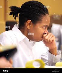 Teah Wimberly, 16, listens to a tape of her confession to police