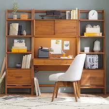 This oversized desktop can hold two computer monitors, perfect for your laptop or desktop pc and all office accessories.environmental protection board: West Elm X Pbt Mid Century Smart Wall Desk Bookshelf Set Pottery Barn Teen