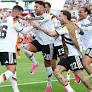 Germany Secures Narrow 2-1 World Cup Win Over Ivory Coast Amidst Fan Celebrations in Berlin