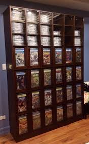 This Is A Full View Of My Custom Cgc Comic Storage Display Cabinet Can Hold About A Thousand Slabs In Total Comic Book Storage Book Storage Comic Book Rooms