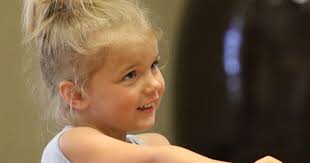 Kids kick it in Taekwondo