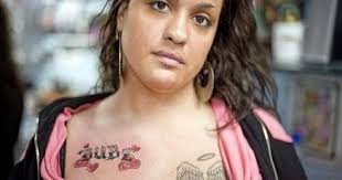 Tattoos mark a life struck by tragedy