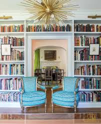 Why not turn it into a reading heaven? Home Library Doorway Framed By Built In Bookshelves Eclectic Den Library Office