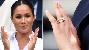 The american actress told while describing the ring, harry said jokingly to markle, make sure it stays on that finger. a close up of kate middleton's engagement ring as she poses for photographs in the state apartments with her. Meghan Markle S Gold And Diamond Band Sparks Engagement Ring Trend Photos Allure