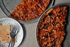 Spread the sauce over the pizza crust. South Shore Bar Pizza Lynwood Cafe In Randolph Ma