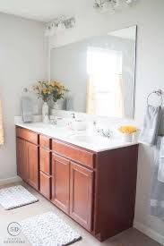 If you want a renovation with a low budget you can use wood as the main material. Affordable Master Bathroom Makeover Simply Designing With Ashley