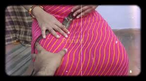 Bhabi talking dirty in Telugu audio and taking cumshot on her saree and  getting horny - XNXX.COM