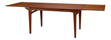 Beautiful, almost tiger like pattern to the wood grain. 1960s Danish Modern Dining Table With Two Pull Out Leaves Chairish
