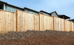 You see a wooden fence. Wooden Fencing By Fenceworks