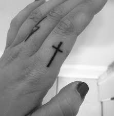 Black And White Pointer Finger I Decided To Get My Cross On My Index Finger Because Whenever You Re Asked About Number One Most People Finger Tattoos Tiny Finger Tattoos Ring Finger Tattoos