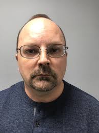 Connecticut hotel owner with 'sex dungeon' charged after attempting to buy  child