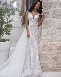 White with lace overlay attached train. Sweety 2020 Collection Lightweight Dress Naira For A Lacing With A Split Trail Covered With 3d La Wedding Dresses Bridal Dresses Wedding Dress Accessories