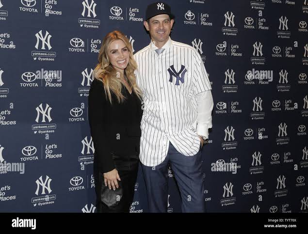 Aaron Boone and Laura Boone stand together after the New York Yankees  introduce Aaron Boone as their new manager at Yankee Stadium in New York  City on December 6, 2017. The Yankees