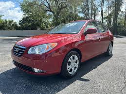Image result for Cardinal Red 1999 Hyundai