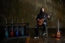 Featuring a mahogany set neck and body, with petrucci's signature neck profile and 12db boost circuit, the majesty delivers incredible tonal versatility. John Petrucci Ernie Ball Music Man Announce Guitar Line