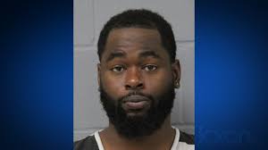 2 arrested after gun goes off inside man's pocket in 6th Street bar,  affidavit says