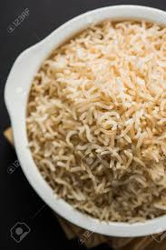 It isn't just the color that sets it apart from its cousin, white rice. Stock Photo Of Cooked Brown Basmati Rice Served In A Bowl Selective Focus Stock Photo Picture And Royalty Free Image Image 87447046