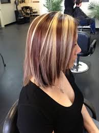 She shows her artistic side using tattoos and hair colors as you don't need to colors all your hair red. Salon Volt Home Page Hair Blonde Highlights Lowlights Blonde Hair With Highlights Red Hair With Blonde Highlights