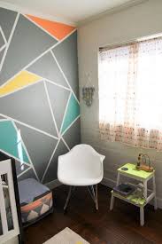Archer S Colorful Nursery With Geometric Elements Boy Room Accent Wall Boy Room Paint Accent Wall Bedroom