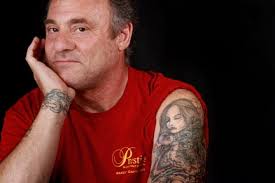 Jeff Rollins' philosophy is illustrated through his tattoos