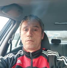 Where is the fuel filter located in a Nissan Caravan?