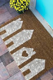 Hold the can a few inches away from the doormat. Paint A Welcoming Mat Give Your Entryway Some Pizazz With A Customized Mat Like The One Seen On Sarah Hearts Sisal Doormat Door Mat Diy Door