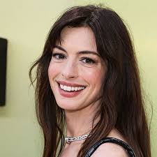 Anne Hathaway Wows In A Striped Vest Set In NYC For 'The Devil Wears Prada  2' Filming