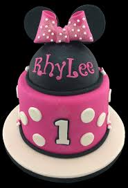 Minnie Mouse Theme 1st Birthday Cake Scrummy Chocolate Cake With A Creamy Vanilla 1st Birthday Cake For Girls Birthday Cake Girls Birthday Cake With Flowers